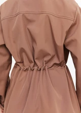 THE UPSIDE women's brown Freddie Fleece Lined Anorak is made from bonded water resistant fabric with internal warm polar fleece and features external pockets with flap closure and drawcord with toggles to cinch in waist.
