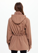 THE UPSIDE women's brown Freddie Fleece Lined Anorak is made from bonded water resistant fabric with internal warm polar fleece and features external pockets with flap closure and drawcord with toggles to cinch in waist.