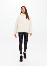 THE UPSIDE women's natural Harlow Fleece Pullover offers a relaxed fit made from recycled warm fleece fabric and features zip pockets and an elastic at waist and cuffs to keep warmth in. Made for lifestyle.