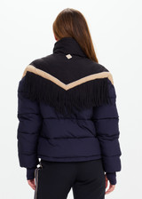 THE UPSIDE women’s navy Hakuba Fox Puffer Jacket is a true-to-size fit, featuring a water-resistant coating, fringed detailing, fleece-lined zip pockets and an adjustable elastic at hem. Designed for Après-ski and winter wear.