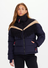 THE UPSIDE women’s navy Hakuba Fox Puffer Jacket is a true-to-size fit, featuring a water-resistant coating, fringed detailing, fleece-lined zip pockets and an adjustable elastic at hem. Designed for Après-ski and winter wear.