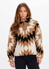 THE UPSIDE women’s Harlow Fleece Pullover is a relaxed pullover style in our geometric star design and features a quarter zip opening, zip pockets and elasticated waist and cuffs to keep warmth in. Designed for Après-ski and winter wear.