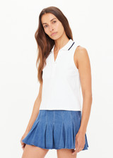 THE UPSIDE women’s white Henri Collared Top, in a cotton pique fabrication, features buttons at the front neck with a ribbed collar in a navy stripe. Designed for tennis. THE UPSIDE women’s white Henri Collared Top, in a cotton pique fabrication, features buttons at the front neck with a ribbed collar in a navy stripe. Designed for tennis.