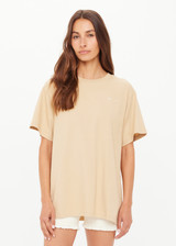THE UPSIDE women’s natural organic cotton Good Luck Sammi Tee is designed for an oversized fit and features "Good Luck" in cream printed on back. Made for versatile styling.