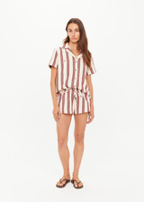 THE UPSIDE women's stripe organic cotton Baja Lucie Drawstring Short has a low-rise cheeky fit, soft elastic waistband, and wooden bead ends on the drawcord. Made for lifestyle.