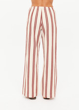 THE UPSIDE women's stripe organic cotton Baja Charli Drawstring Pant is low-rise with a straight leg, soft elastic waistband, and wooden bead ends on drawcord. Made for lifestyle.