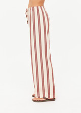 THE UPSIDE women's stripe organic cotton Baja Charli Drawstring Pant is low-rise with a straight leg, soft elastic waistband, and wooden bead ends on drawcord. Made for lifestyle.