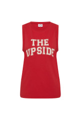 THE UPSIDE women's red organic cotton Jeet Tank Top has a relaxed fit with folded armhole detail and cream varsity logo at chest. Made for everyday wear.