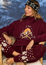 THE UPSIDE women’s maroon organic cotton Le Ski Clementine Crew is designed for an oversized fit and features Le Ski logo print & embroidery on front chest. Designed for Après-ski and winter wear.