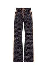 THE UPSIDE women's jacquard Ezra Nova Flare Pant features a monogram geometric design and an elasticated waistband with drawcord. Made for lifestyle.