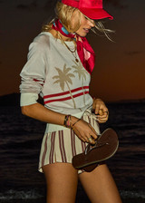 THE UPSIDE women's creme organic cotton Palma Joni Knit Crew features raglan sleeves, palm tree chest design, and red stripes around back and sleeves. Made for lifestyle.