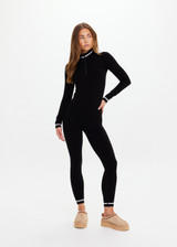 THE UPSIDE women’s black merino Wool Seamless 25inch Legging offers a soft & comfortable fit and features white striped ribbing on cuffs. Designed for Après-ski and winter wear.