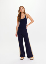 THE UPSIDE women’s navy organic cotton Equine Raf Knit Tank is designed for a slim fit and features a racerback design with tan stripe detailing along neck and armhole. Made for everyday.