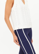 THE UPSIDE women’s cream organic cotton Espada Hermina V Neck Vest is designed for a regular fit and features a chunky cable knit texture. The perfect lifestyle piece.