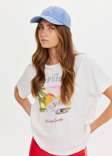 THE UPSIDE women's blue cotton Washed Denim Soft Cap offers a soft, retro fit with an embroidered cream horseshoe logo and an adjustable back strap. Made for everyday wear.