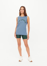 THE UPSIDE women’s denim organic cotton Jeet Tank Top has a relaxed fit with folded arm detail and a green logo at the front. Made for lifestyle.