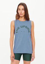 THE UPSIDE women’s denim organic cotton Jeet Tank Top has a relaxed fit with folded arm detail and a green logo at the front. Made for lifestyle.
