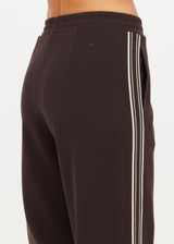 THE UPSIDE women's brown lenzing viscose Petra Flare Pant features splits at hem bottoms and side seam pockets. Made for lifestyle.