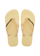 THE UPSIDE women's yellow Havaiana Brazil Logo has a slip-on design, made from flexible Brazilian rubber and features flag pin detail. Made for everyday wear.