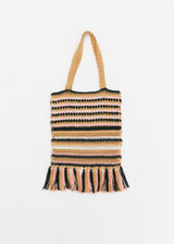 THE UPSIDE women's stripe Bohemia Kelly Crochet Bag is an organic hand-crochet tote with knotted tassel details and wooden beads. Made for lifestyle.