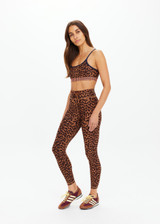 THE UPSIDE women's leopard Malawi Badu Crossback Bra offers soft & supportive fit with a scooped front neckline, crossback straps and removable cups. Made for yoga & pilates.