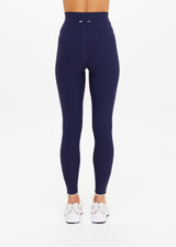THE UPSIDE women's navy recycled peached Maison 25inch Midi Pant is mid-rise and features cream scalloped edge trim at hem. Made for yoga & pilates.