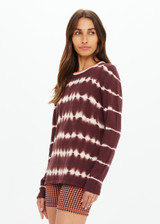 THE UPSIDE women's brown & cream tie dye organic cotton Amana Long Sleeve Knit is designed for a relaxed fit and features a contrast striped neckline in orange. Made for everyday.