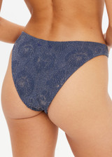 THE UPSIDE women's navy jacquard Secretos Moss Pant offers medium coverage in a textured floral and metallic fabrication. Designed for swim.