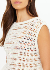 THE UPSIDE women's natural organic cotton Kamali Knit Fringe Top has a loose, boxy fit with scooped low back and knitted fringe detailing at hem. Made for lifestyle.