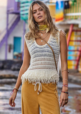 THE UPSIDE women's natural organic cotton Kamali Knit Fringe Top has a loose, boxy fit with scooped low back and knitted fringe detailing at hem. Made for lifestyle.