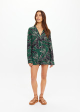 THE UPSIDE women's floral Tamara Rio Collared Shirt is a true-to-size fit featuring a green palm print, pearlised shell buttons and contrast cream piping. Made for lifestyle.