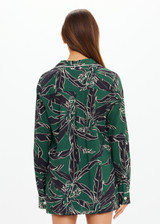 THE UPSIDE women's floral Tamara Rio Collared Shirt is a true-to-size fit featuring a green palm print, pearlised shell buttons and contrast cream piping. Made for lifestyle.