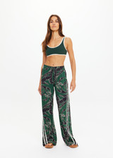 THE UPSIDE women's floral Tamara Juliet Pant is low-waisted with split hem detail and contrast cream side binding. Made for everyday.