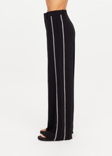 THE UPSIDE women's black Haveli Wide Leg Pant is true to size with a structured waistband, fly zipper, belt loops, and cream embroidered side seams. Made for lifestyle.