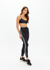 THE UPSIDE women's black Moonstone Zoe Bra offers a soft, supportive fit with a scooped low neckline, T-bar back, and adjustable elastic straps. Made for yoga & pilates.