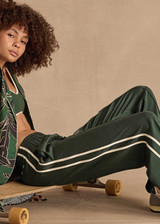 THE UPSIDE women's green Marnie Silk Wide Leg Pant is true to size with high-rise fit, elasticated waistband, and cream side seam bindings. Made for lifestyle.