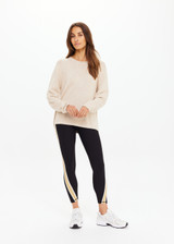 THE UPSIDE women's natural Felice Knit Crew offers a relaxed fit with a silk noil-cotton blend, featuring a ribbed neckline and cuffs. Made for lifestyle.