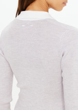 THE UPSIDE women's grey Faye Fine Knit Polo is slim fit in 100% merino wool with contrast cream accents and front button closure. Made for lifestyle.