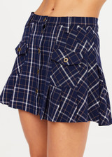 THE UPSIDE women's check Valencia Jones Pleated Skirt is true to size with structured waistband, belt loops, and antique brass button closure at centre front. Made for lifestyle.