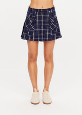 THE UPSIDE women's check Valencia Jones Pleated Skirt is true to size with structured waistband, belt loops, and antique brass button closure at centre front. Made for lifestyle.