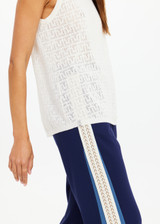 THE UPSIDE women's cream organic cotton Chennai Knitted Tara Tank is designed for a regular fit and features a 'TU' monogram and ribbed neckline. Made for lifestyle.