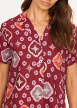 THE UPSIDE women's maroon linen viscose Miri Andie Shirt is designed for an oversized fit and features a printed tie-dye geometric design and shell button closure. Made for lifestyle.