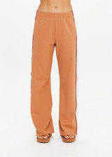 THE UPSIDE women's orange Lenzing viscose Marnie Wide-Leg Pant has a true-to-size fit with a high-rise elasticated waistband and welt pockets. Made for lifestyle.