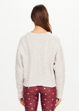 THE UPSIDE women's natural wool blend Xanthe Crew Neck Knit Sweater has a relaxed fit with cable knit and decorative blanket stitching. Made for lifestyle.