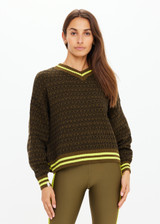 THE UPSIDE women's olive organic cotton Castilla Clementine Knit Crew is designed for a relaxed fit and features a high V neckline with lime-striped rib. Made for lifestyle.