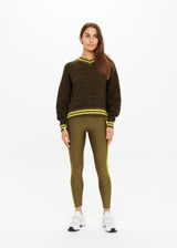 THE UPSIDE women's olive organic cotton Castilla Clementine Knit Crew is designed for a relaxed fit and features a high V neckline with lime-striped rib. Made for lifestyle.