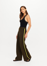 THE UPSIDE women's olive organic cotton Castilla Juniper Knit Pant has a soft and supportive fit and features a straight leg with contrast side stripes. Made for lifestyle.