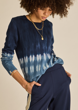 THE UPSIDE women's tie dye organic cotton Seeker Amana Long Sleeve Knit is designed for a regular fit and features a ribbed neckline. Made for lifestyle.
