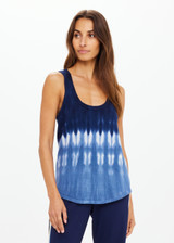THE UPSIDE women's tie dye organic cotton Seeker Emma Knitted Tank Top is designed for a regular fit and features a tonal ribbed neckline and armholes. Made for lifestyle.