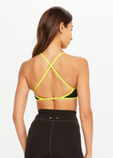 THE UPSIDE women's olive jacquard Castilla Anya Crossback Bra is designed for a soft and comfortable fit and features a high neck crossback bra with removable cups. Made for yoga and pilates.